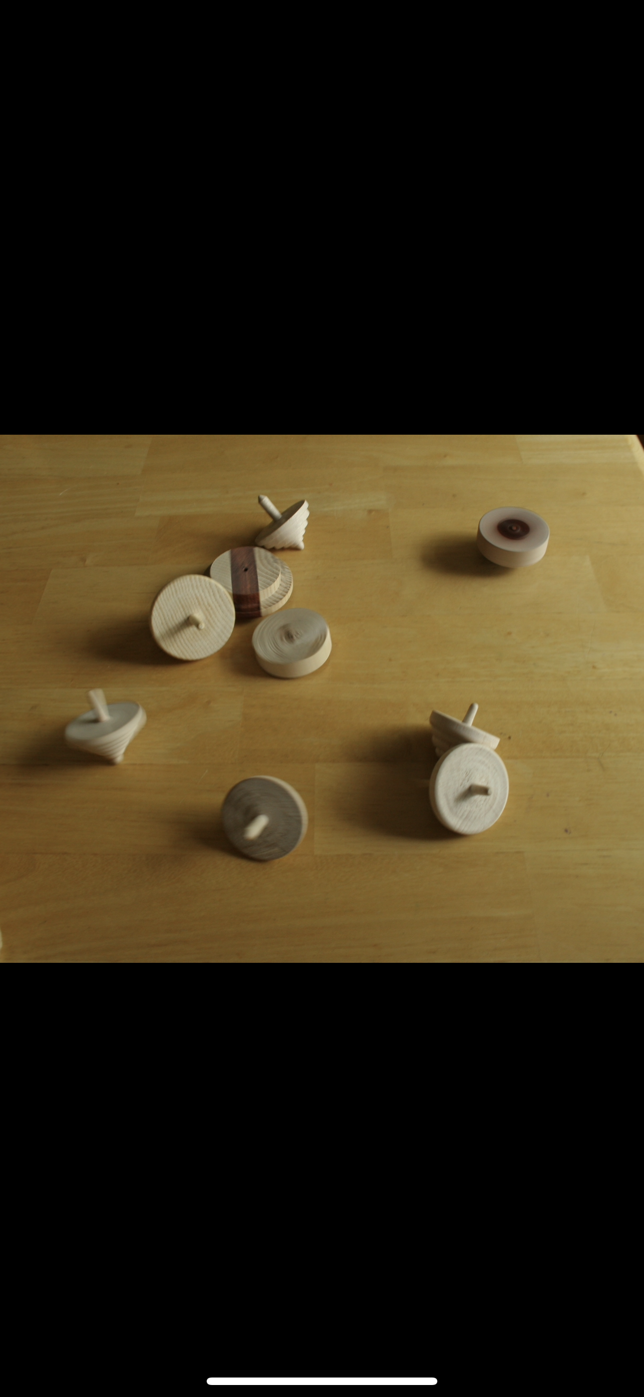 Hand turned spinning tops
